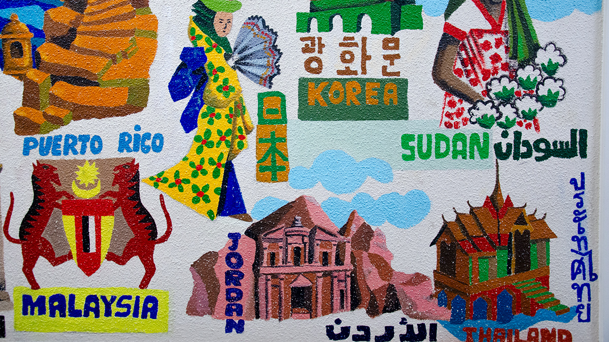 mural featuring the names of various countries